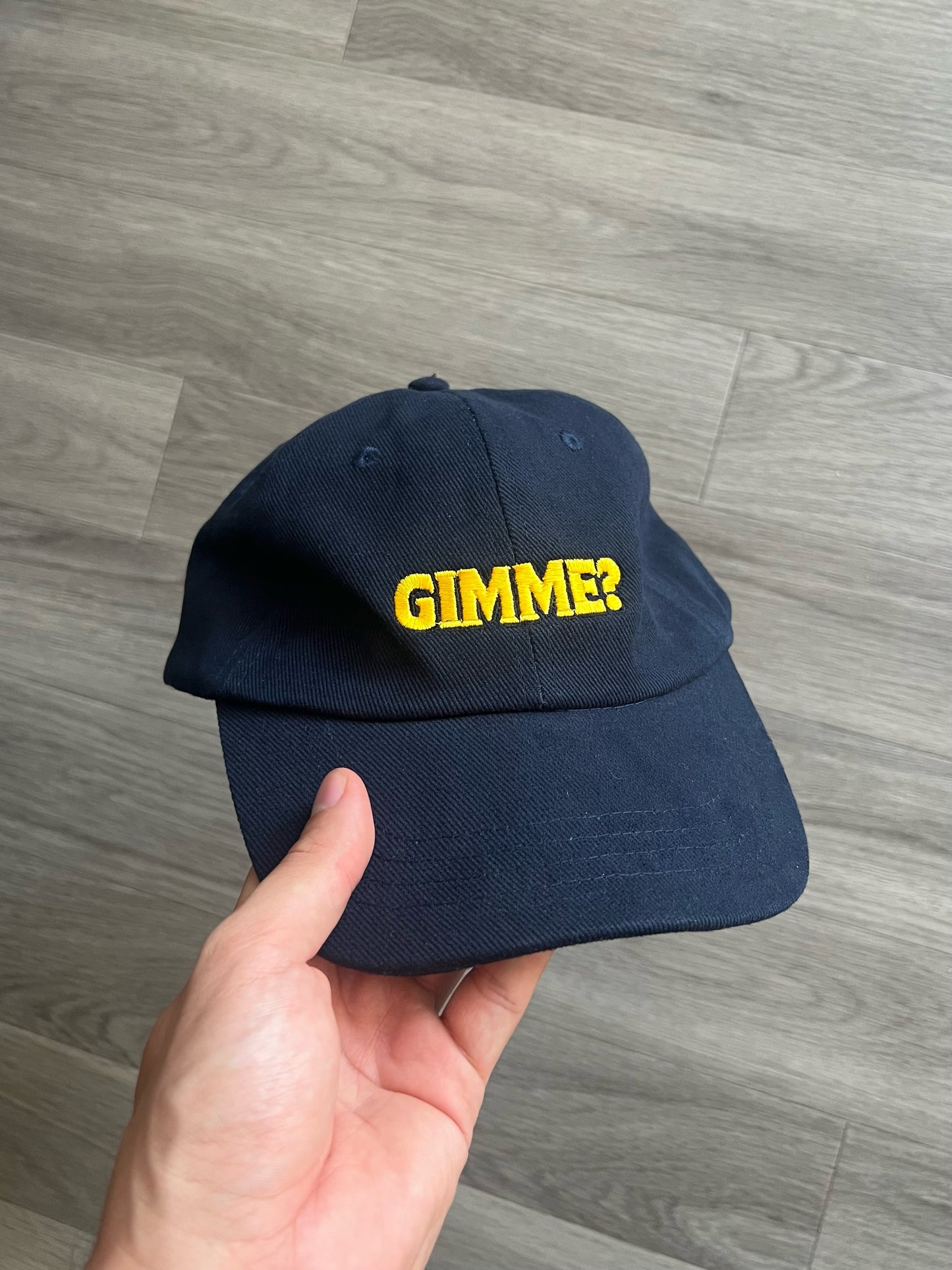 "Gimme?" cap